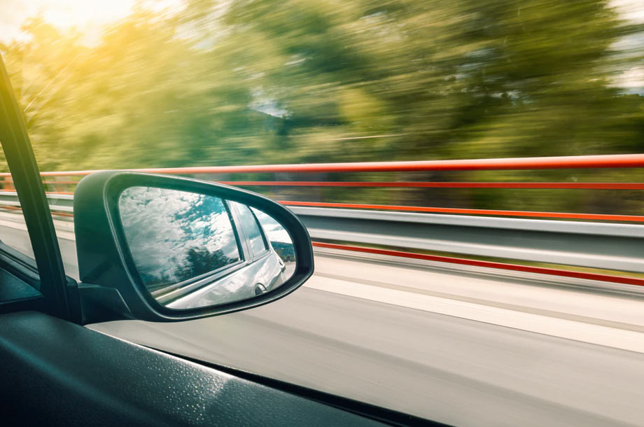 View looking out of car window | Auto Insurance